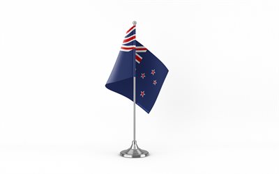 4k, neuseeland tischflagge, weißer hintergrund, neuseeländische flagge, tischflagge von neuseeland, neuseeländische flagge auf metallstock, neuseeland flagge, nationale symbole, neuseeland