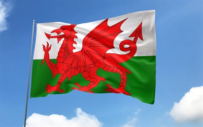 Wales flag on flagpole, 4K, European countries, blue sky, flag of Wales, wavy satin flags, Welsh flag, Welsh national symbols, flagpole with flags, Day of Wales, Europe, Wales flag, Wales