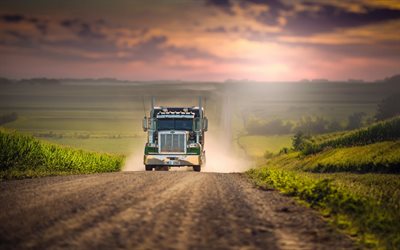 camiones Peterbilt, carretera, puesta de sol, el polvo