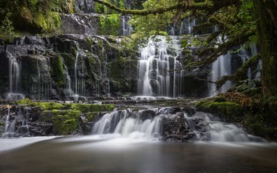 Purakaunui Cae, un lago, una hermosa cascada, roca, bosque, Nueva Zelanda
