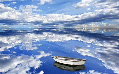 il lago, le nuvole, la riflessione, la barca