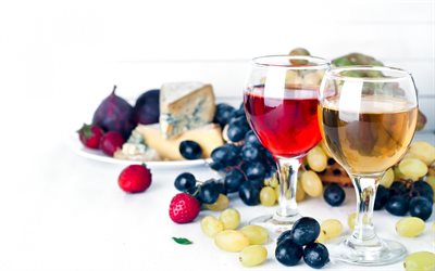 vitt och rött vin, druvor, glas rött vin, vita druvor, glas vitt vin, vinkoncept