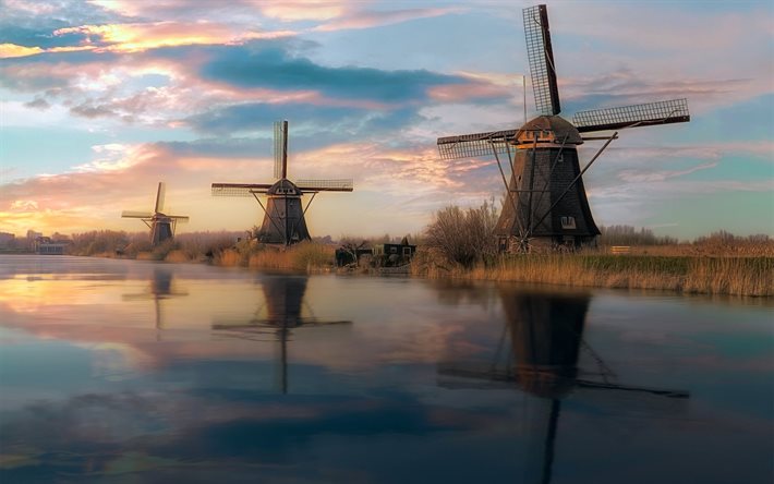 Kinderdijk, wooden mills, sunset, evening, river, Molenlanden, South Holland, Netherlands