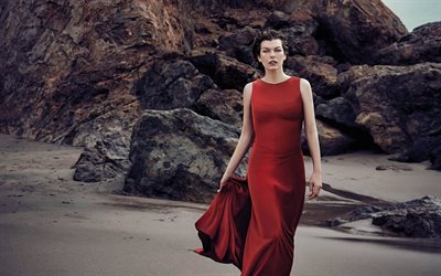 Milla Jovovich, rocas, actriz, Harpers Bazaar, 2016, con un vestido rojo, niñas, belleza