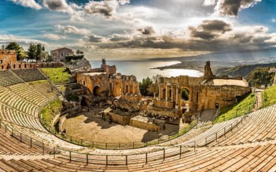 Ancient theater of Taormina, ancient Greek theatre, ruins, Taormina, Sicily, Ionian Sea, evening, sunset, Messina cityscape, Italy