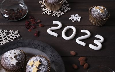 Happy New Year 2023, dark wooden background, 2023 concepts, 2023 greeting card, chocolate cupcakes, 2023 Happy New Year