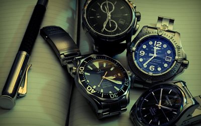 handle, notepad, wrist watch