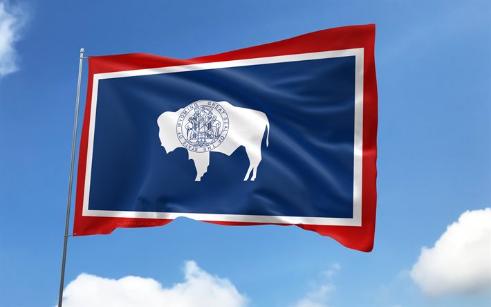 Wyoming flag on flagpole, 4K, american states, blue sky, flag of Wyoming, wavy satin flags, Wyoming flag, US States, flagpole with flags, United States, Day of Wyoming, USA, Wyoming