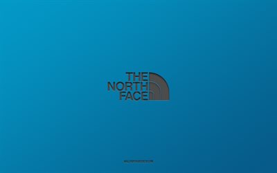 The North Face logo, brands, blue background, The North Face emblem, carbon art, The North Face, popular clothing manufacturers, carbon logo, The North Face carbon logo