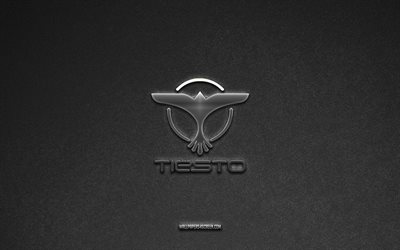 Tiesto logo, music brands, gray stone background, Tiesto emblem, music logos, Tiesto, music signs, Tiesto metal logo, stone texture