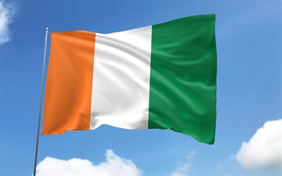 Ivorian flag on flagpole, 4K, African countries, blue sky, flag of Ivory Coast, wavy satin flags, Ivorian flag, Ivorian national symbols, flagpole with flags, Day of Ivory Coast, Africa, Cote d Ivoire flag, Cote d Ivoire