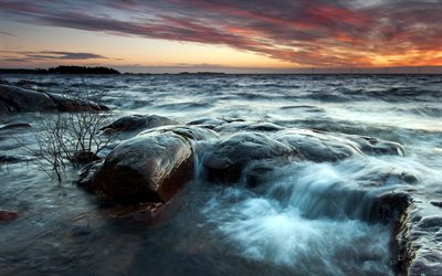 sea, waves, sunset, stones in water, wind power plant, evening