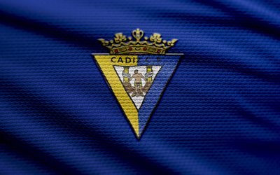 Cadiz CF fabric logo, 4k, blue fabric background, LaLiga, bokeh, soccer, Cadiz CF logo, football, Cadiz CF emblem, Cadiz CF, spanish football club, Cadiz FC