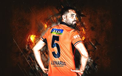 Leonardo Duarte, Istanbul Basaksehir, portrait, Brazilian football player, orange stone background, Turkey, football, Basaksehir