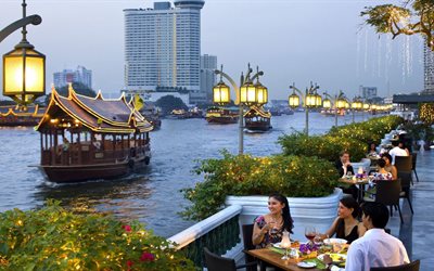 bangkok, gratte-ciel, un café, une lampe de poche, des bateaux, de l'étang, de la thaïlande