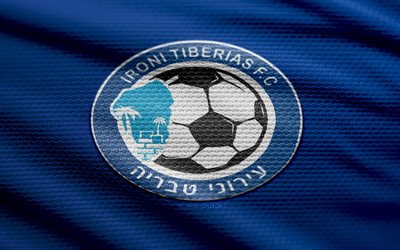 Ironi Tiberias fabric logo, 4k, blue fabric background, Ligat HaAl, bokeh, soccer, Ironi Tiberiaslogo, football, Ironi Tiberias emblem, Ironi Tiberias, Israeli Premier League, Israeli football club, Ironi Tiberias FC
