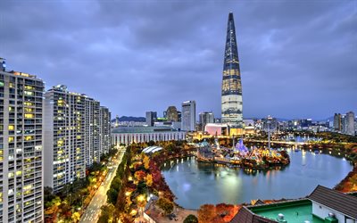 seoul, lotte world tower, kväll, solnedgång, mulet, skyskrapor, moderna byggnader, seoul stadsbild, lotte world, största nöjespark inomhus, sydkorea