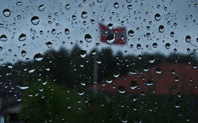 il vetro, la pioggia, gocce