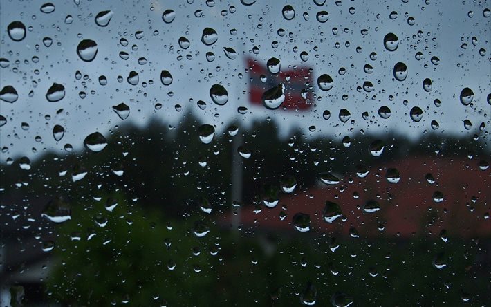 il vetro, la pioggia, gocce