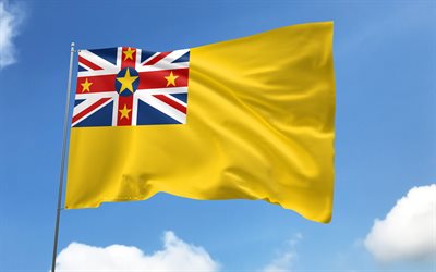 bayrak direğinde niue bayrağı, 4k, okyanusya ülkeleri, mavi gökyüzü, niue bayrağı, dalgalı saten bayraklar, niue ulusal sembolleri, bayraklı bayrak direği, niue günü, okyanusya, niue