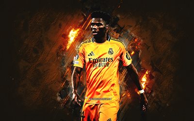 Aurelien Tchouameni, Real Madrid, French footballer, orange stone background, grunge art, La Liga, Spain, football, Tchouameni Real Madrid