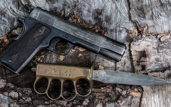 m1911, self-loading pistol, knife-brass knuckles, photo of weapons