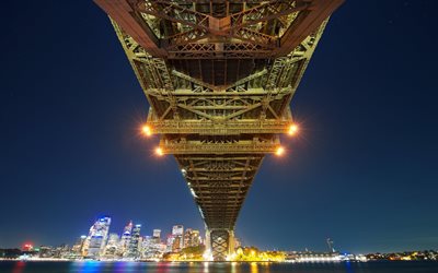 la nuit, le pont du port de sydney, en australie, à sydney, le pont en arc