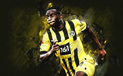 Youssoufa Moukoko, German footballer, Borussia Dortmund, BVB, portrait, yellow stone background, Bundesliga, Germany, football