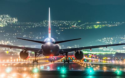 la notte in aeroporto, le luci, l'aereo, atterraggio