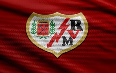 Rayo Vallecano fabric logo, 4k, red fabric background, LaLiga, bokeh, soccer, Rayo Vallecano logo, football, Rayo Vallecano emblem, spanish football club, Rayo Vallecano FC