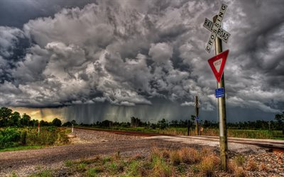 storm clouds, rain, rainfall, railroad crossing